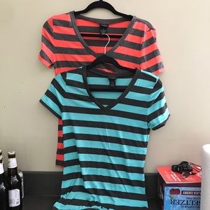 A grey and pink shirt, grey and blue shirt